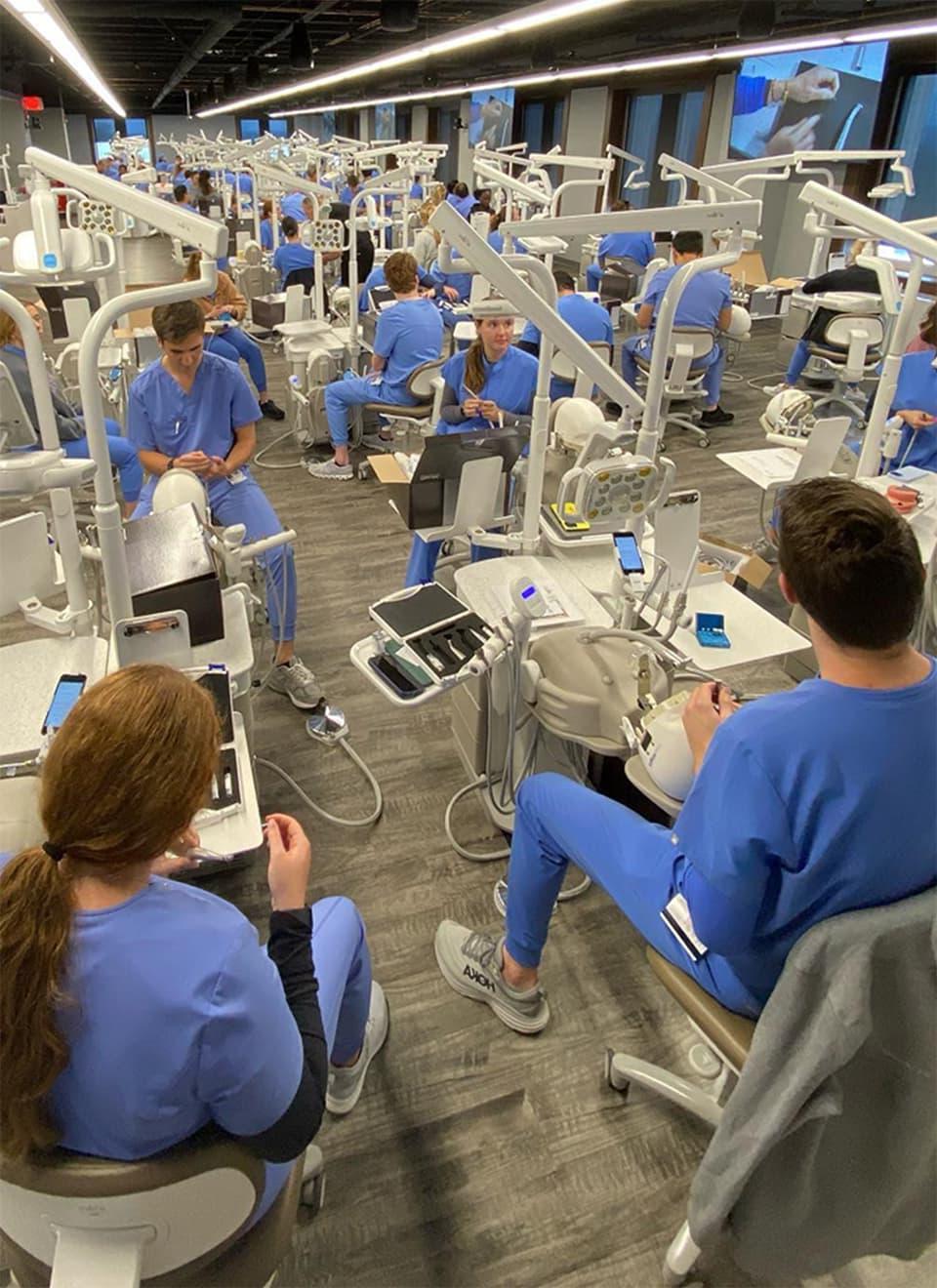 dental students in lab learning techniques